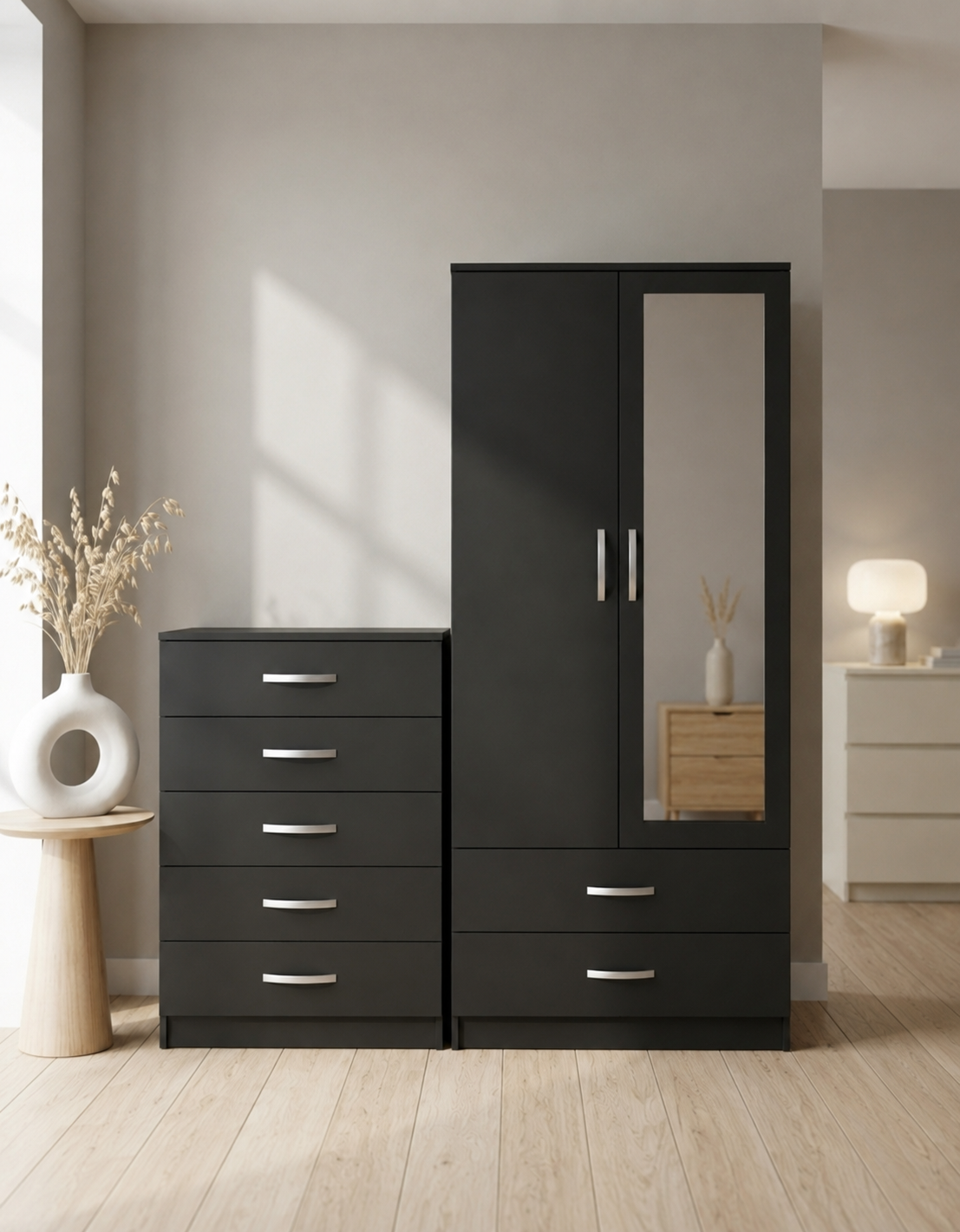 Black 2-doors mirrored wardrobe and 5-drawer chest of drawers bedroom furniture set for just £270. This 2-piece bedroom set comes ready assembled.